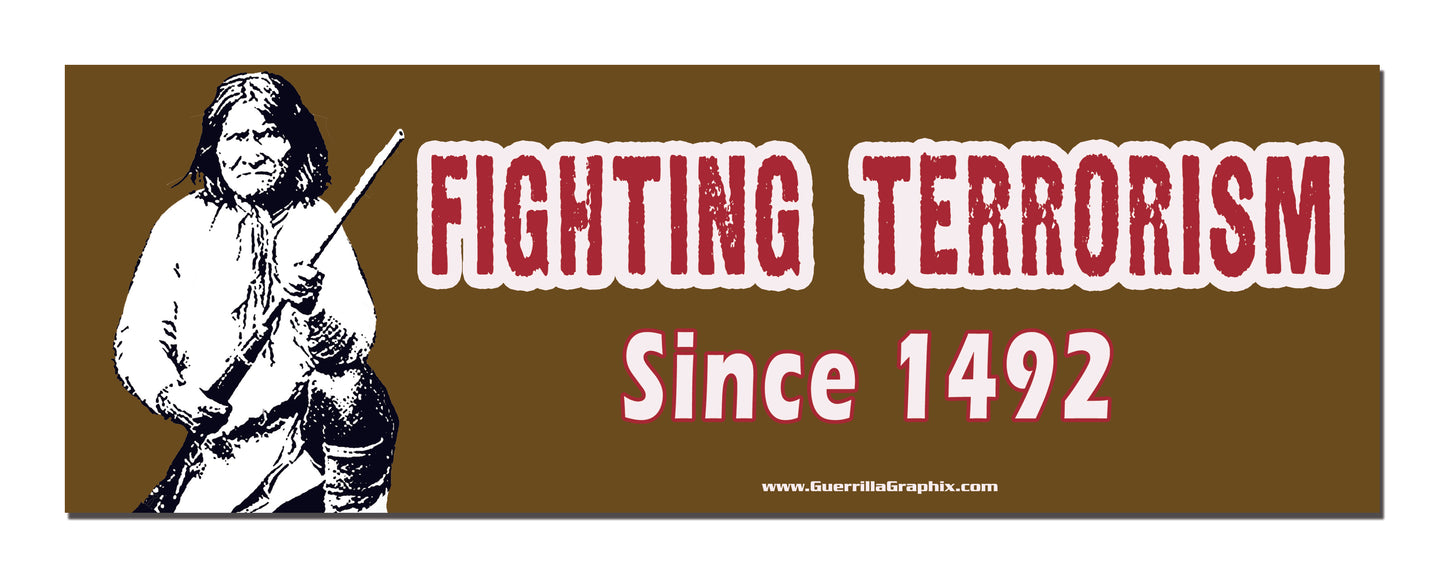 A paper sticker with a gloss finish featuring an illustration of a person holding a staff or club, with the text 'FIGHTING TERRORISM Since 1492' printed above.