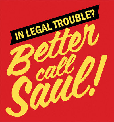 A red paper sticker with the text 'In Legal Trouble? Better call Saul!' in yellow lettering, resembling a well-known television show title.