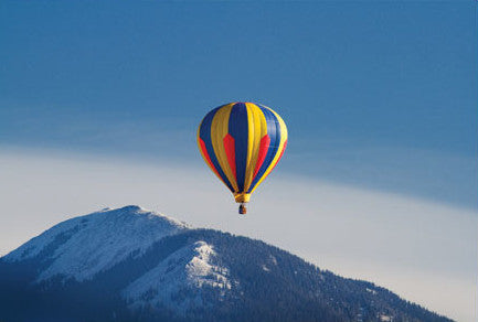 Balloon over Taos mountain postcard